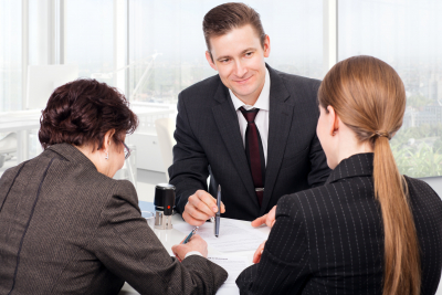 notary public signing documents of his customers